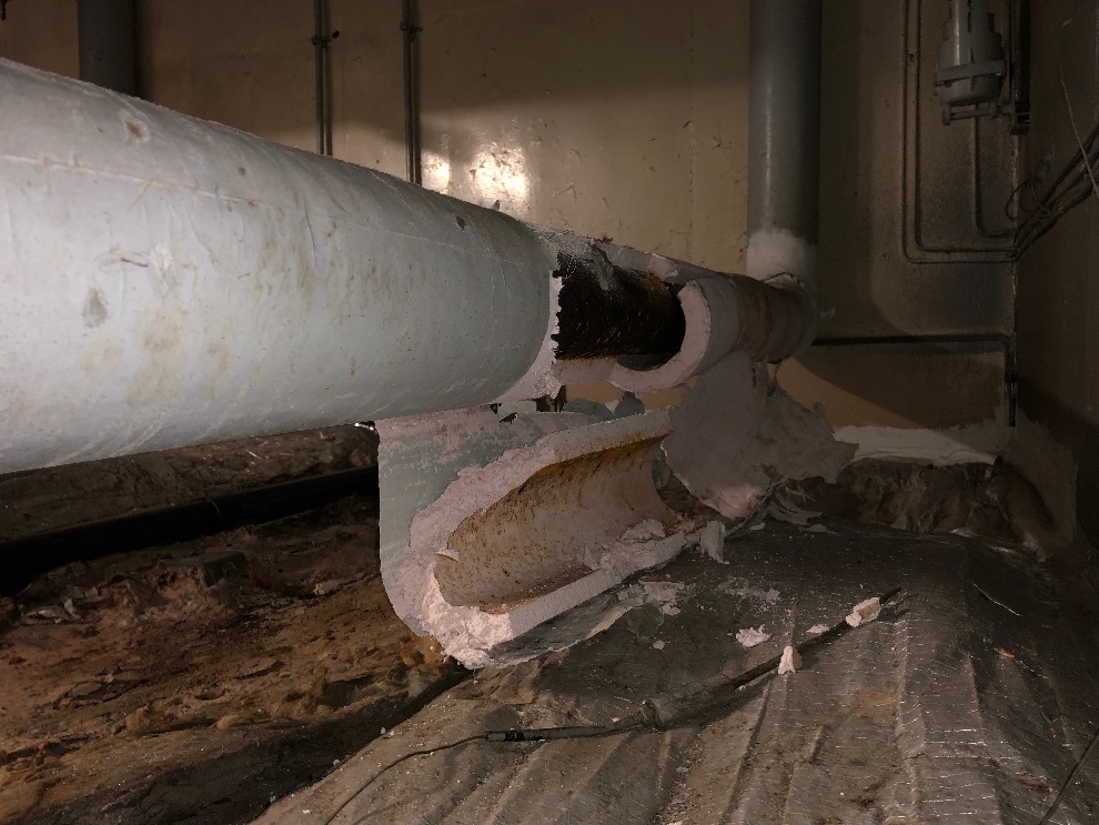 Asbestos pipe insulation inspection